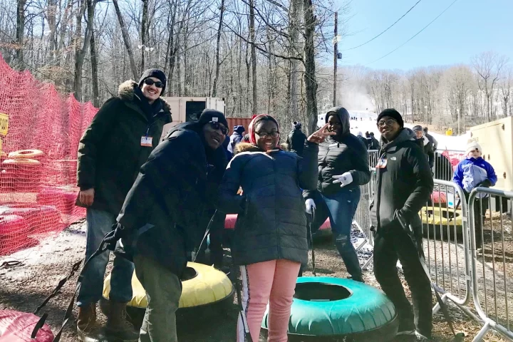 Brooklyn-based youth go snow-tubing with coaches from the Graham SLAM initiative.