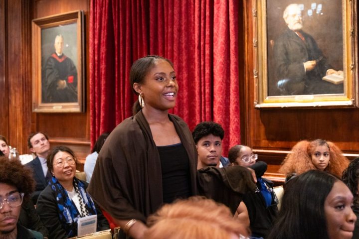 A young adult in our Graham SLAM initiative stands up to comment on the Graham WORKS initiative